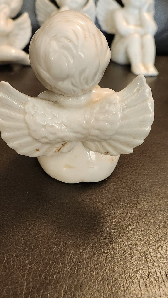 Set of 4 Porcelain Angel Figurines