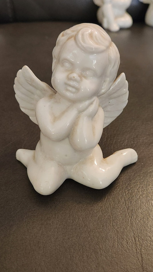 Set of 4 Porcelain Angel Figurines