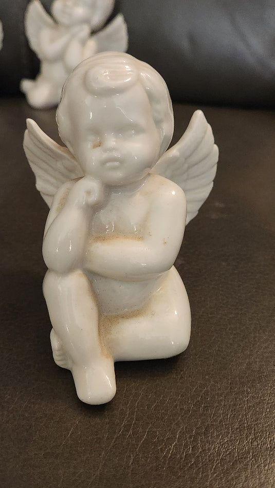 Set of 4 Porcelain Angel Figurines