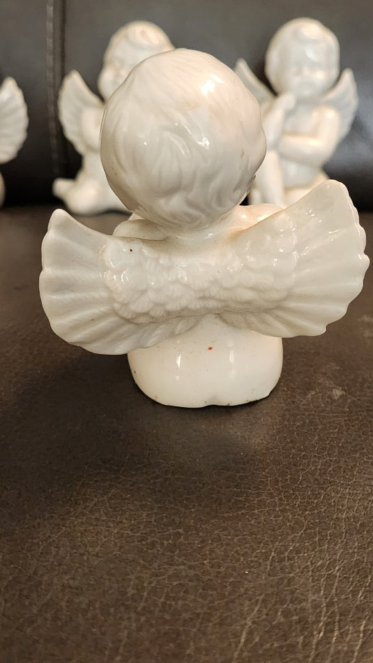 Set of 4 Porcelain Angel Figurines