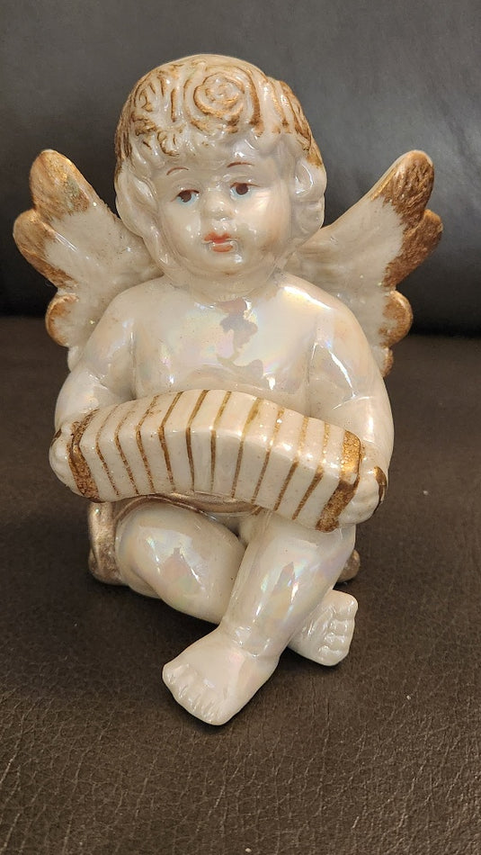 Set of 4 Porcelain Angel Figurines